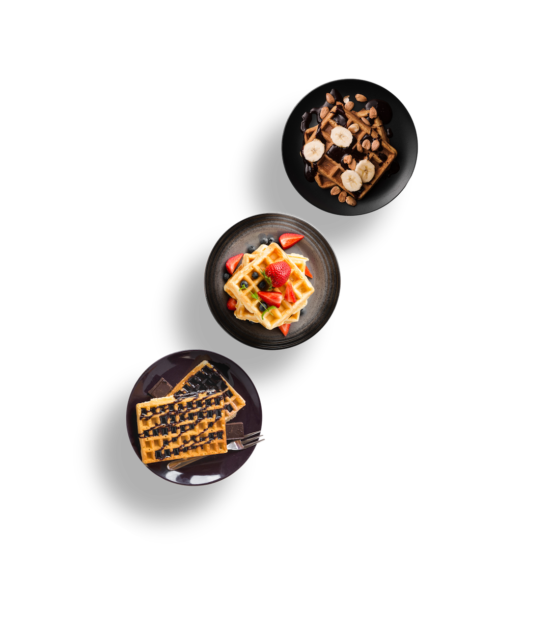 Three plates of waffles